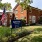 View of leasing office and apartment sign